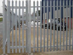 A galvanized palisade swing pedestrian gate with single leaf